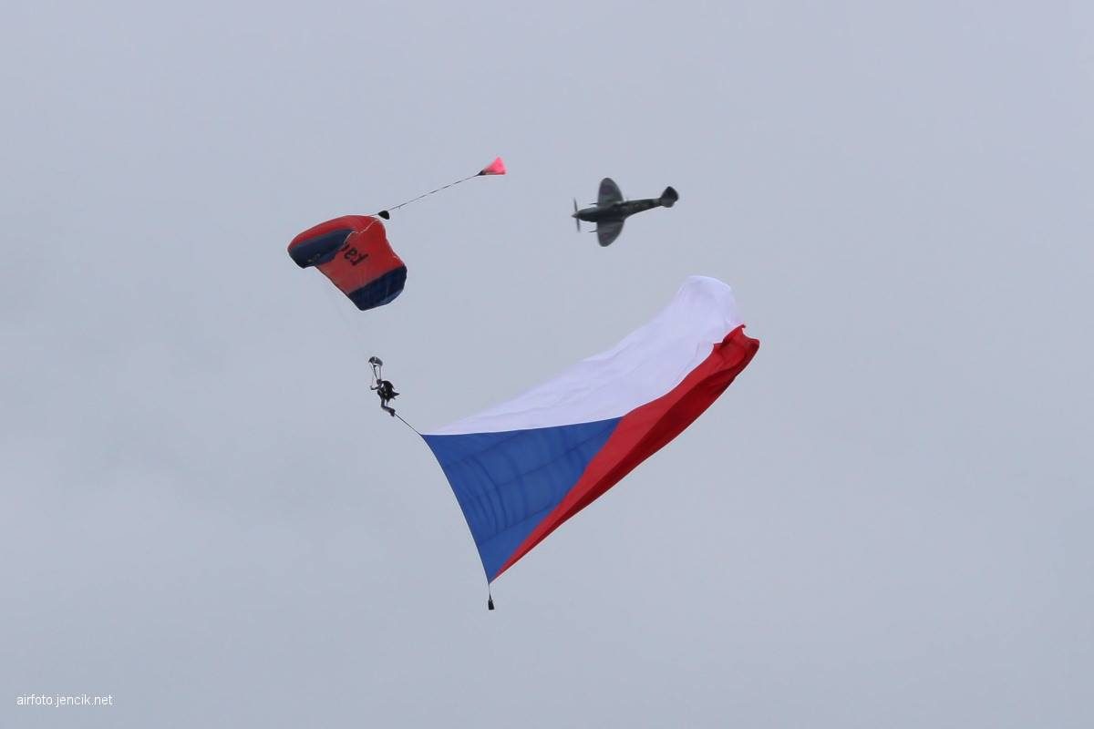 A display jump with the Czech flag and an accompanying aircraft