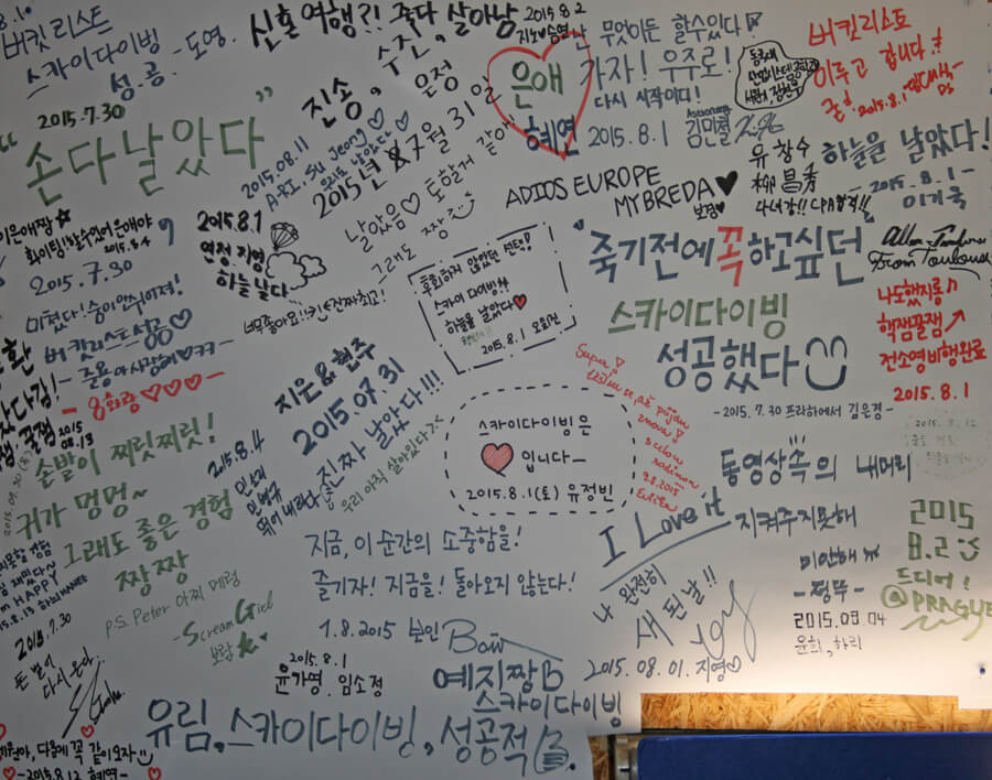 Korean messages from passengers on the wall in the Skydive Kantor hangar